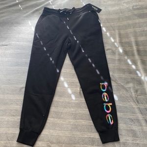 bebe black sweatpants with rainbow sequins